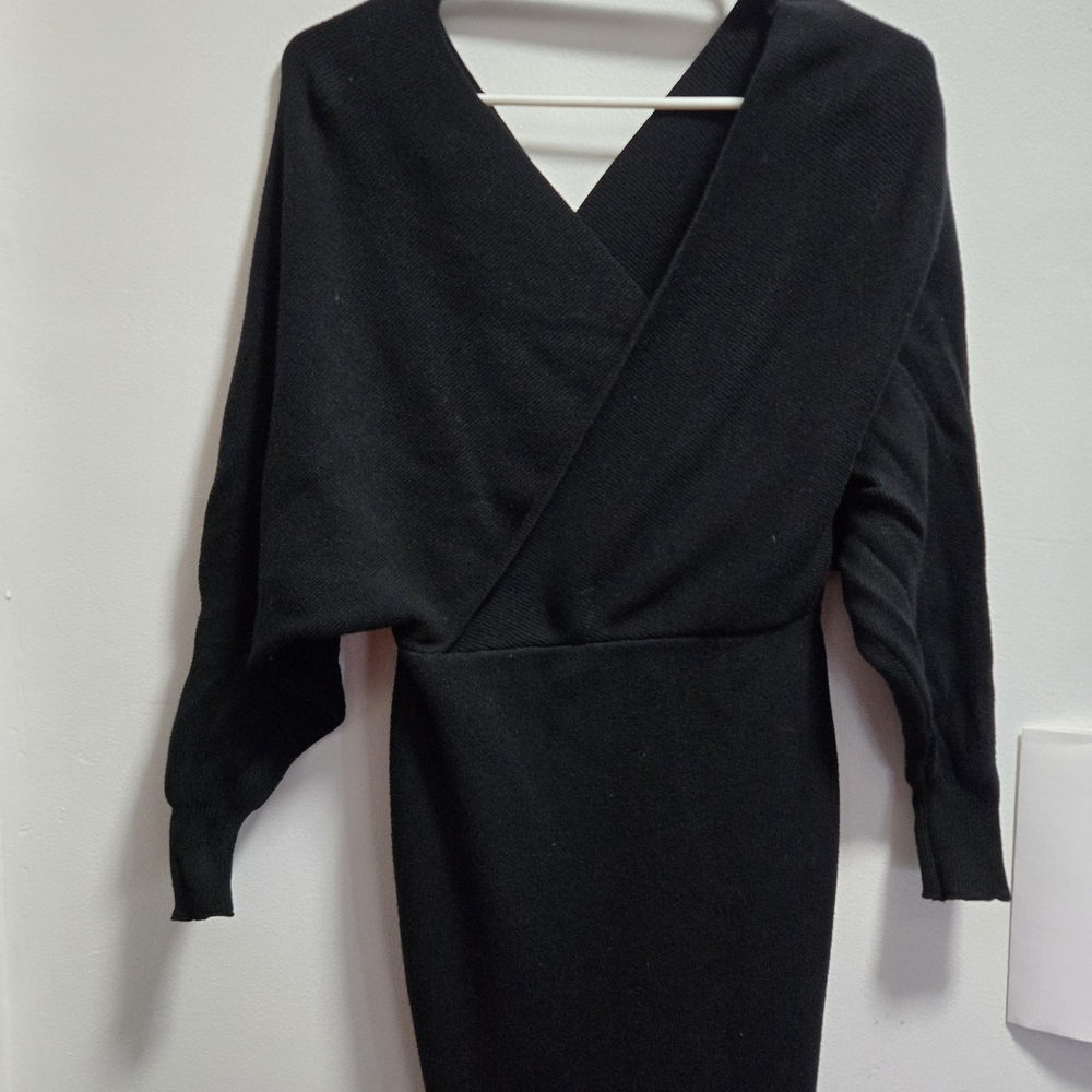 Luxxel black mini sweater dress features a wrap-front V-neck design